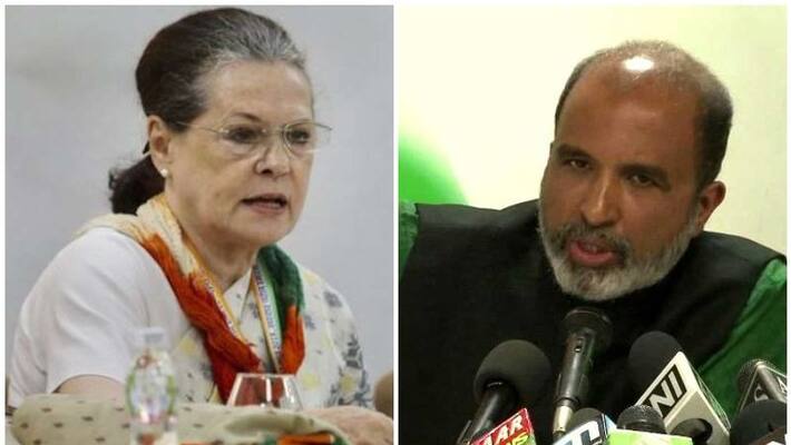 Sonia Gandhi on Wednesday removed Sanjay Jha as a party spokesperson after he wrote a newspaper article critical of the party Sonia Gandhi on Wednesday removed Sanjay Jha as a party spokesperson after he wrote a newspaper article critical of the party