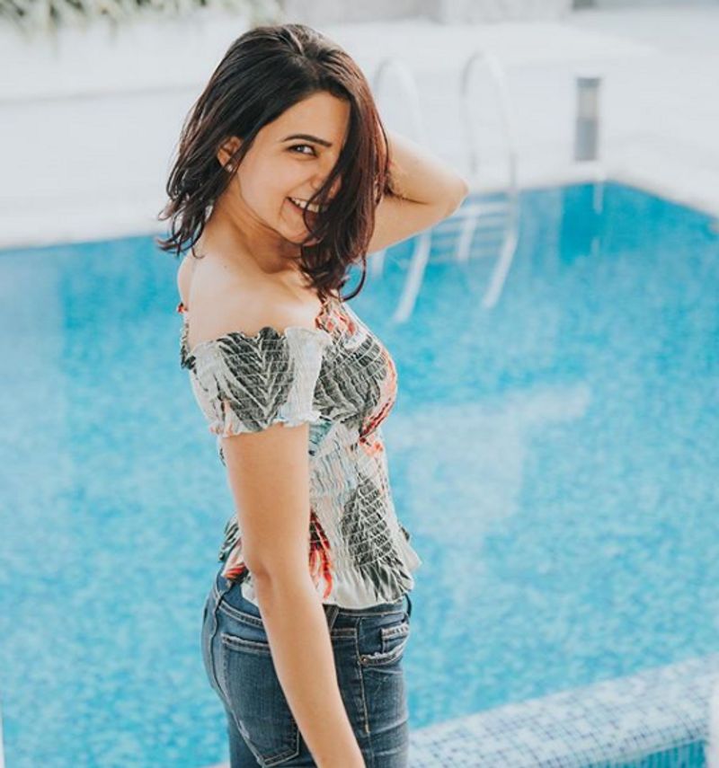 She was wearing an off-shoulder top and jeans

