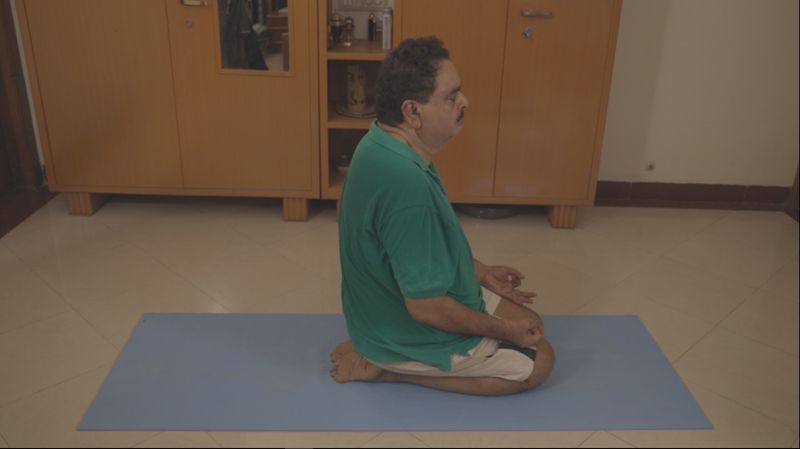 B Ramanath Rai performs Yoga day in his native house