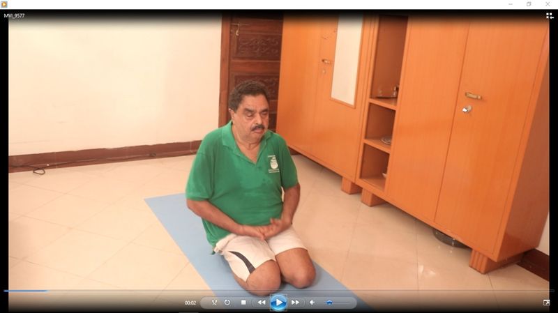 B Ramanath Rai performs Yoga day in his native house