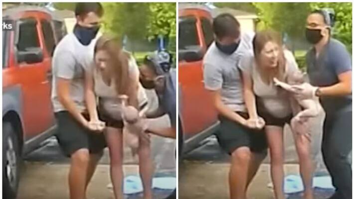 woman delivers baby in the parking lot of hospital woman delivers baby in the parking lot of hospital