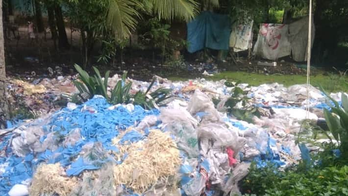 plastic waste dumped in housing area plastic waste dumped in housing area