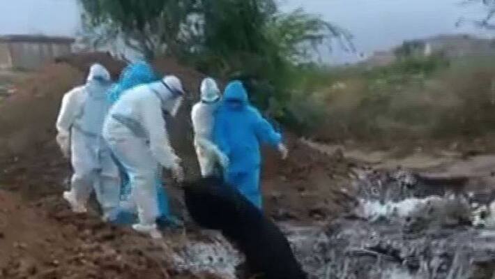 Bodies of COVID19 victims dumped in large pit in Karnataka Bellary probe ordered Bodies of COVID19 victims dumped in large pit in Karnataka Bellary probe ordered