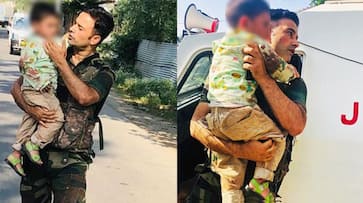 J K Police jump to the rescue of 3 yr old during terror attack