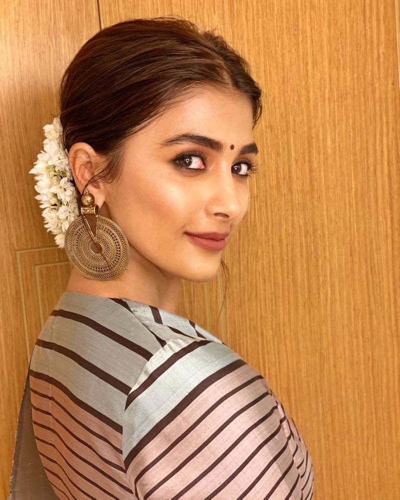 some sizzling pictures of the model turned actress Pooja Hegde