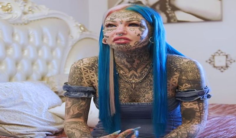 dragon girl amber luke spends 90 lakh rupees on extreme body modification including 600 tattoos to breast hip implants kph