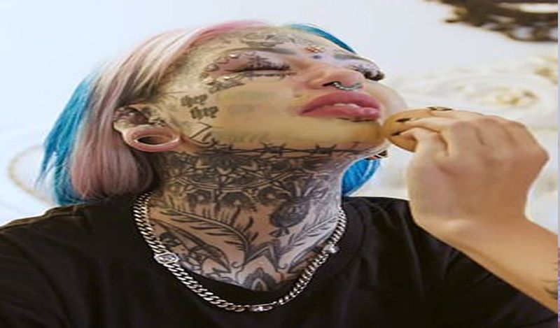 dragon girl amber luke spends 90 lakh rupees on extreme body modification including 600 tattoos to breast hip implants kph