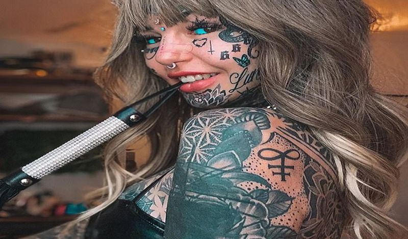 dragon girl amber luke spends 90 lakh rupees on extreme body modification including 600 tattoos to breast hip implants kph