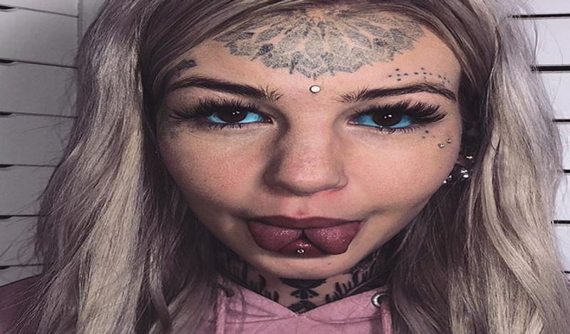 dragon girl amber luke spends 90 lakh rupees on extreme body modification including 600 tattoos to breast hip implants kph