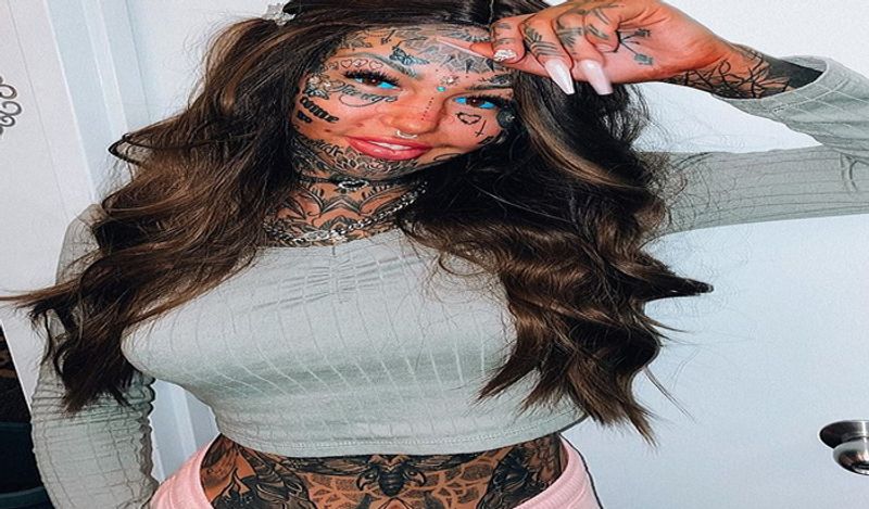 dragon girl amber luke spends 90 lakh rupees on extreme body modification including 600 tattoos to breast hip implants kph