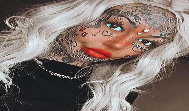 dragon girl amber luke spends 90 lakh rupees on extreme body modification including 600 tattoos to breast hip implants kph