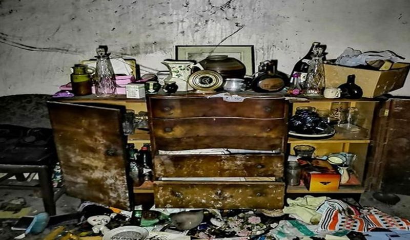 horrifying photos of abandoned house of sadness left to rot from 17 years after widow died cursing husband death kph '