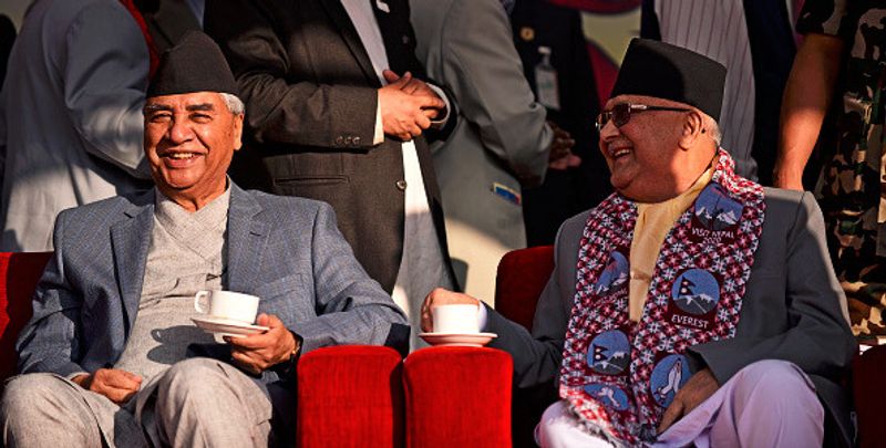 চিনা ওষুধে আটকাবে ভাঙন?
তবে চিনের এত চেষ্টার পরও নেপালি কমিউনিস্ট পার্টিতে ভাঙন রোখা যাবে বলে মনে করছেন না রাজনৈতিক বিশ্লেষকরা। কাঠমান্ডু পর্যবেক্ষকরা বলছেন ওলি নিজেই নিজের পায়ের তলার মাটি খুঁড়েছেন। তা ফেরানোর আর সম্ভাবনা নেই। পরিবর্তে, তিনি দল ভেঙে বেরিয়ে গিয়ে শের বাহাদুর দেউবা-র নেতৃত্বাধীন নেপালি কংগ্রেসের সাথে জোট বেঁধে সরকার ধরে রাখার পথে হাঁটতে পারেন।
