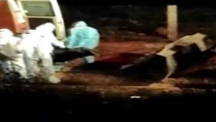 coronavirus patient bodies thrown in pit using jcb in andhra pradesh video is viral bsm coronavirus patient bodies thrown in pit using jcb in andhra pradesh video is viral bsm