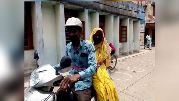 A man brings his corona suspect mother to hospital by bike as no ambulance was arranged RT A man brings his corona suspect mother to hospital by bike as no ambulance was arranged RT