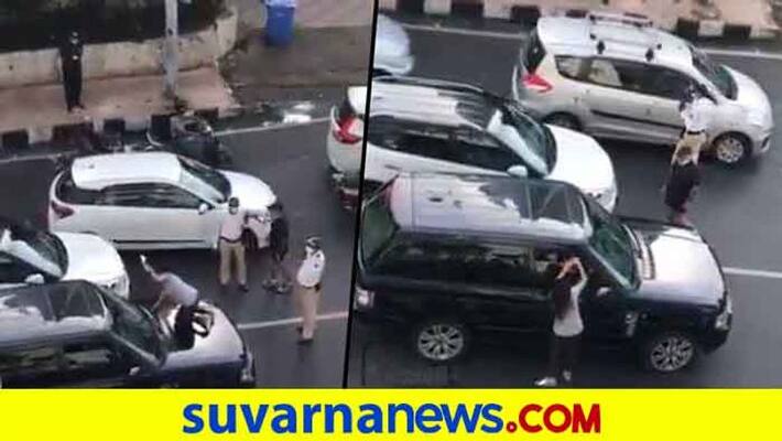 Furious Indian Wife Climbs Atop Car Bonnet on Catching Husband Red-Handed With 'Girlfriend Furious Indian Wife Climbs Atop Car Bonnet on Catching Husband Red-Handed With 'Girlfriend