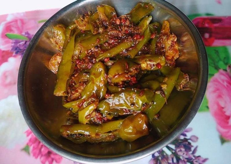 karonde mirchi fry recipe in hindi women can use all time cranberry mirchi fry recipe kpt