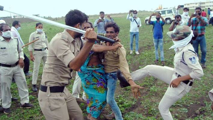 Cops in MP brutally assault Dalit couple, kids and kin for resisting removal of encroachment Cops in MP brutally assault Dalit couple, kids and kin for resisting removal of encroachment