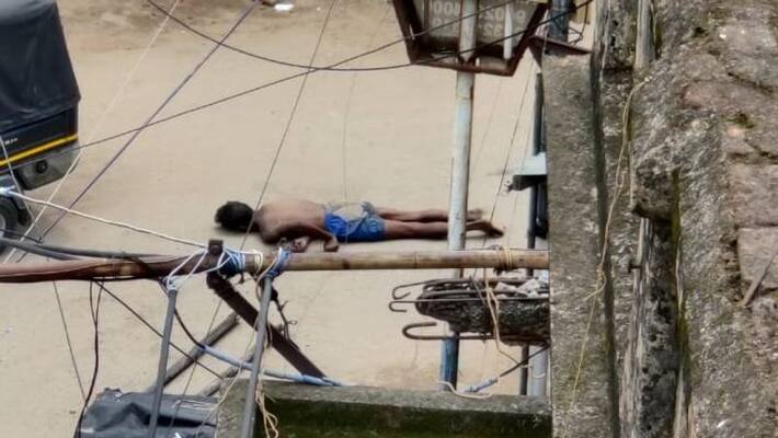 police removed a dead body with stick in purulia bsm police removed a dead body with stick in purulia bsm