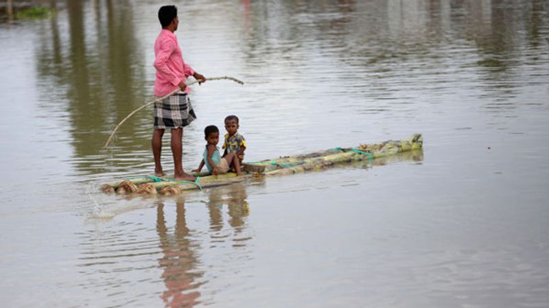 assam flood real bahubali save fawn old bangladesh picture viral kpt
