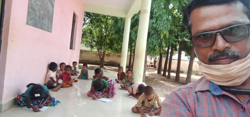 Teacher Lesson to Students Maintaining Social Distance in Koppal District