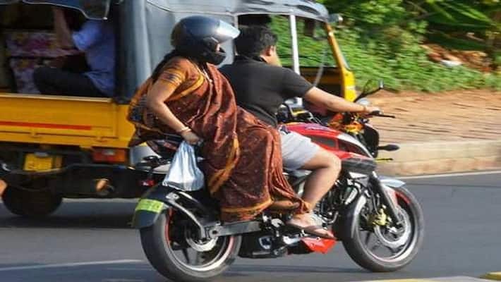 new rules for bikers: Centre makes it mandatory to have handholds, saree guards for bikes new rules for bikers: Centre makes it mandatory to have handholds, saree guards for bikes