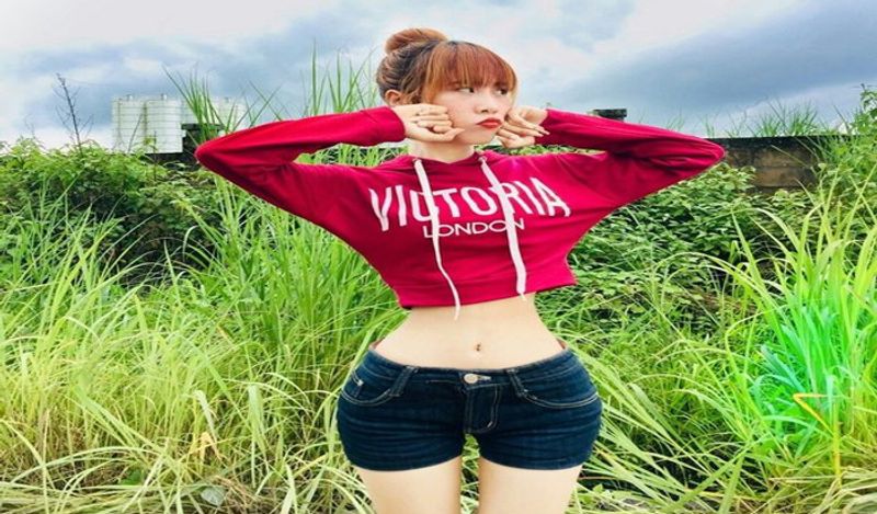 Myanmar woman, 23, with a TINY 13.7in waist that's thought to be the one of the world's smallest claims she simply eats healthily