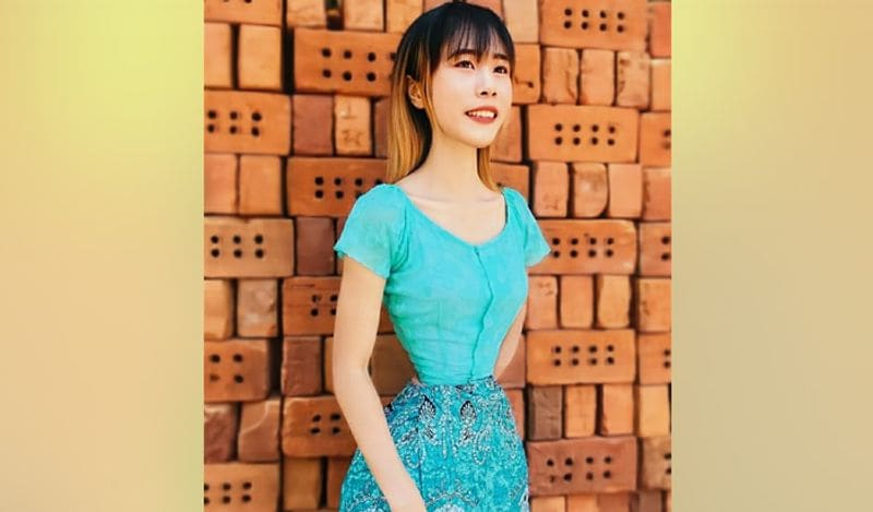 Myanmar woman, 23, with a TINY 13.7in waist that's thought to be the one of the world's smallest claims she simply eats healthily