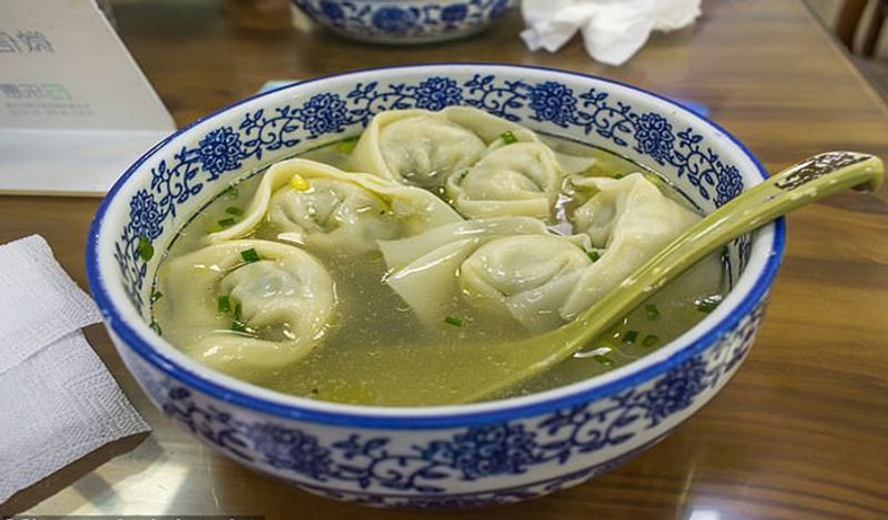 Man blocked bowel 'explodes' after he ate a big bowl of dumplings before doctors save him in emergency surgery