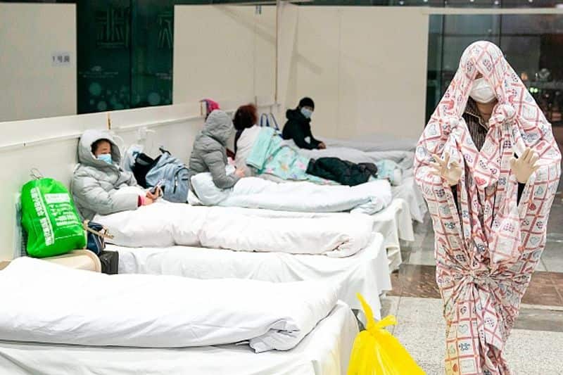 corana in china: More Chinese cities look to lockdown as coronavirus outbreak spreads