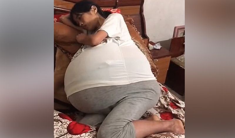 mysterious chinese woman whose belly ballooned uncontrollably from two years now begged for help kph