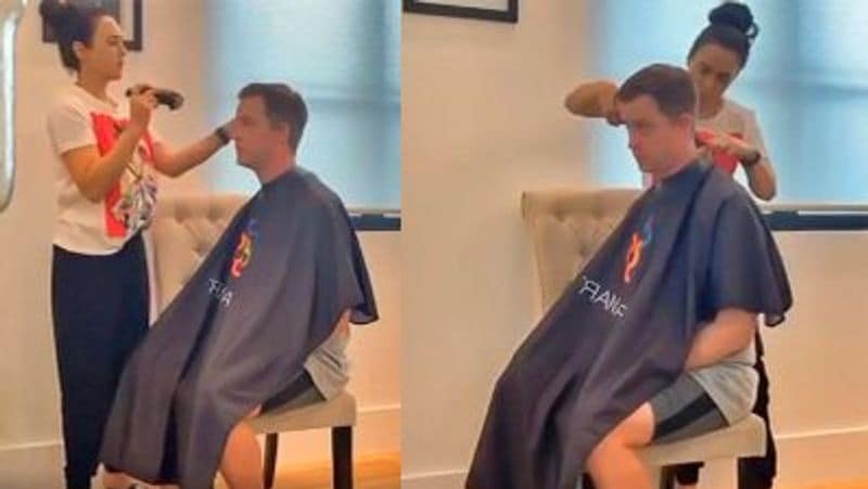 Preity Zinta cuts husband gene goodenough hair professionaly