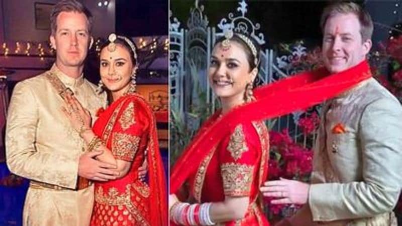 Preity Zinta cuts husband gene goodenough hair professionaly