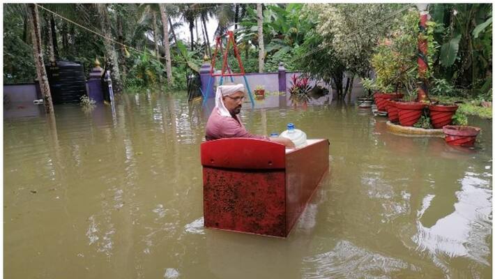 man converts old refrigerator as boat in Kuttanad man converts old refrigerator as boat in Kuttanad