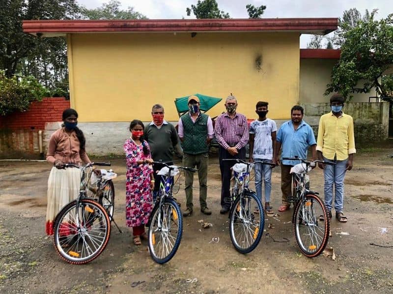 Karnataka rains: Father-son duo donates bicycles to students, workers in flood-affected Kodagu-dmn