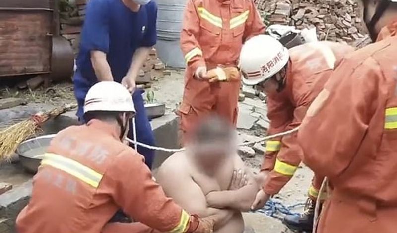 125 kg overweight chinese man stuck in well rescue operation photos goes viral kph