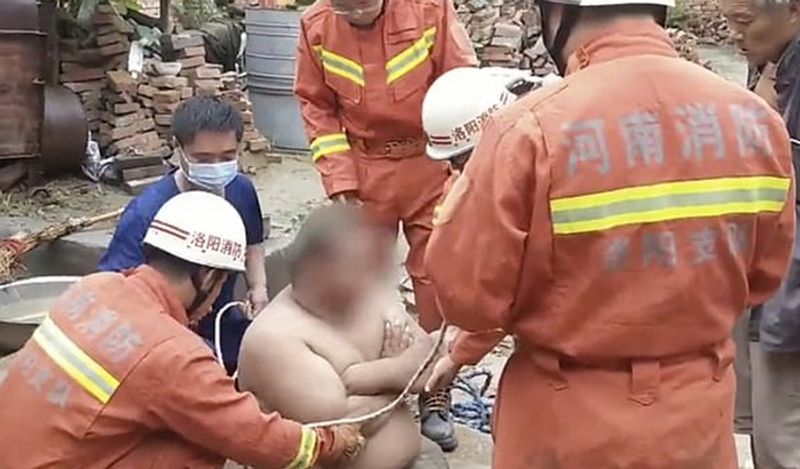 125 kg overweight chinese man stuck in well rescue operation photos goes viral kph