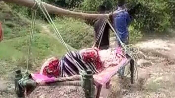 madhya pradesh woman carried to hospital on cot in anuppur district kpr madhya pradesh woman carried to hospital on cot in anuppur district kpr