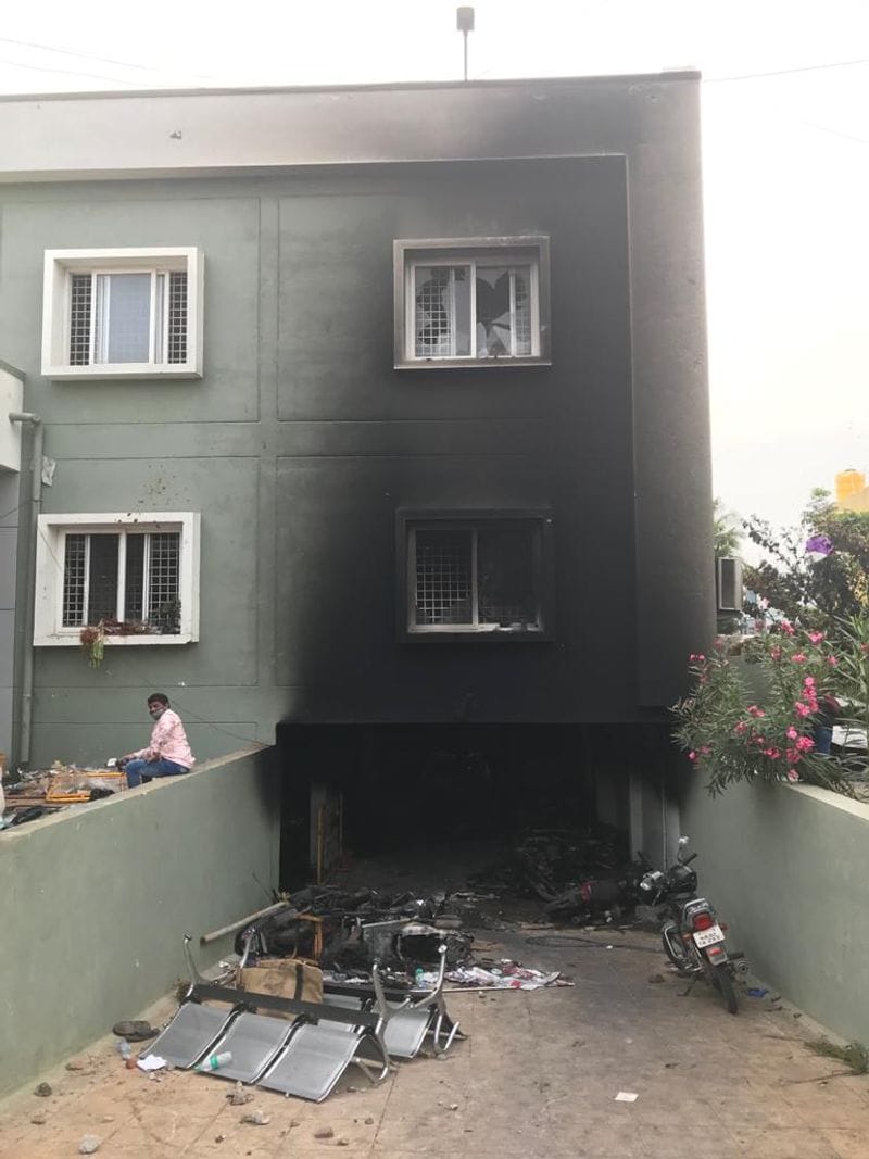 Police station covered in thick black soot that was caused by the smoke from vehicles burnt
