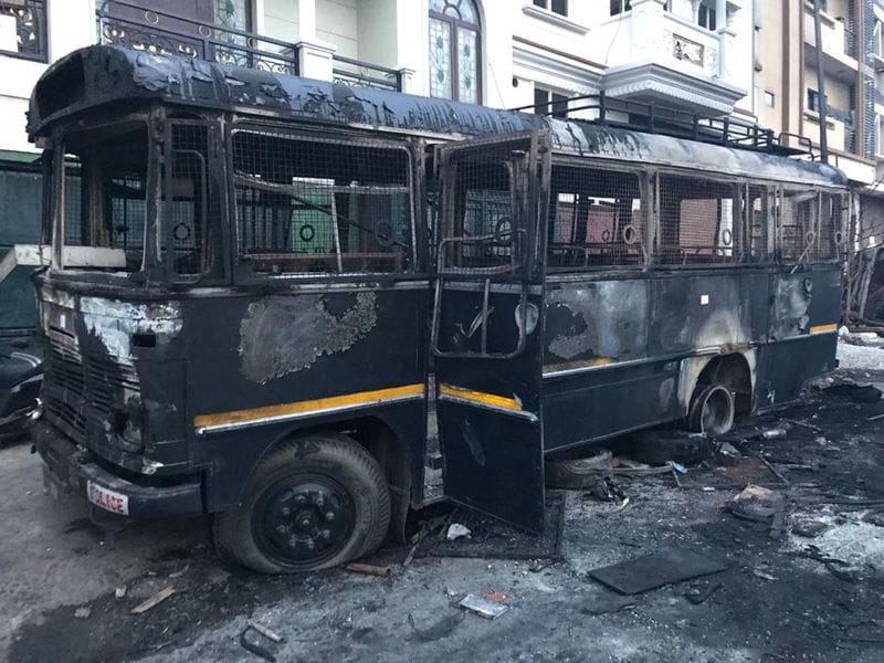 A police van too was not spared by the irate mob
