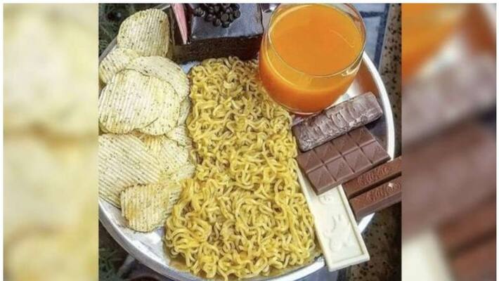 woman online posted a picture of Maggi, chocolates, chips, pastry, and juice all on the same plate woman online posted a picture of Maggi, chocolates, chips, pastry, and juice all on the same plate