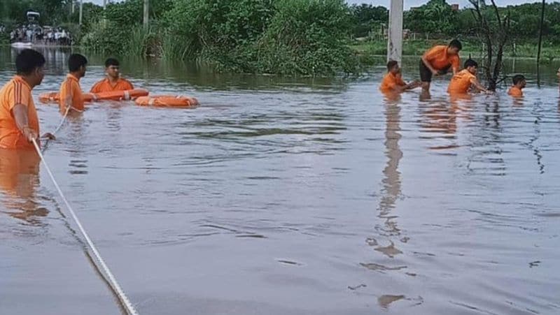rajasthan monsoon alert jaipur heavy rain flooding bolero swollen drain kanota dam death of husband wife and son