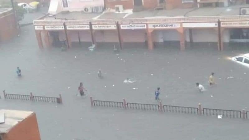 rajasthan monsoon alert jaipur heavy rain flooding bolero swollen drain kanota dam death of husband wife and son