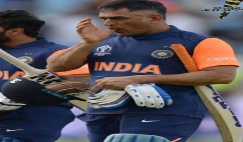 mahendra singh dhoni viral photo of spitting blood on cricket ground goes viral kph