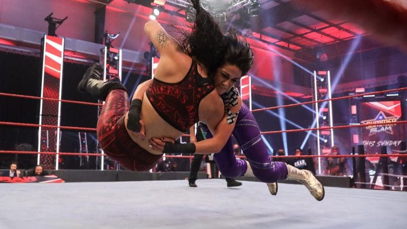 Asuka & Shayna Baszler defeated Sasha Banks & Bayley