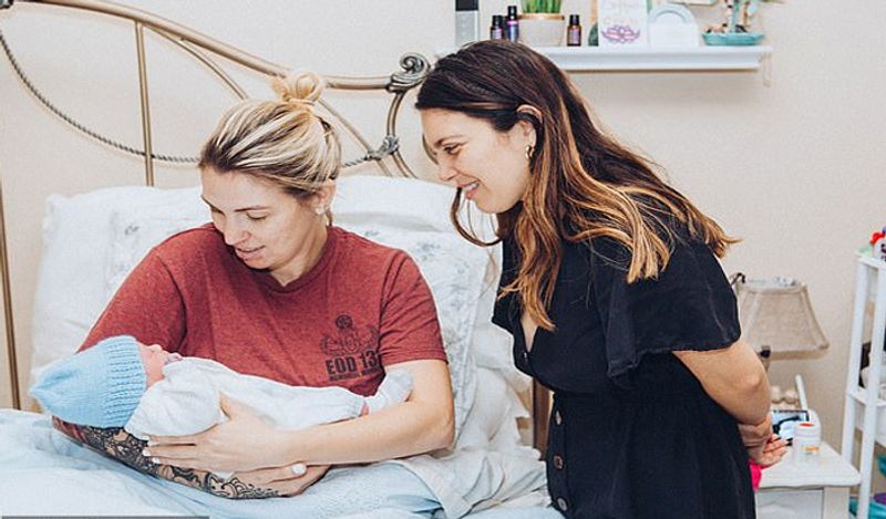 emotional photos of surrogate child birth infront of two fathers goes viral kph