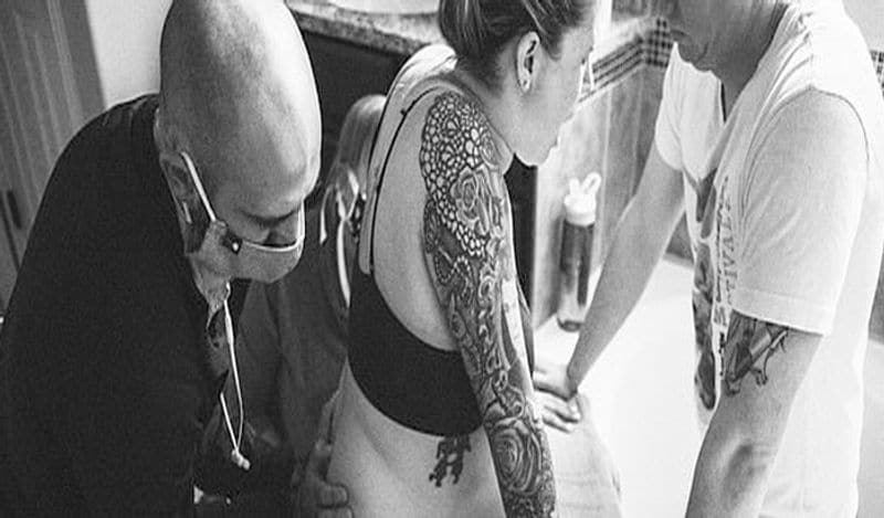 emotional photos of surrogate child birth infront of two fathers goes viral kph