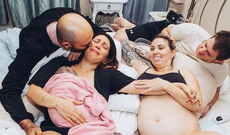 emotional photos of surrogate child birth infront of two fathers goes viral kph