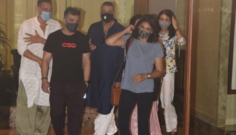 Actor Sanjay Dutt shows a thumbs-up sign as he leaves from his residence for Kokilaben hospital in Mumbai