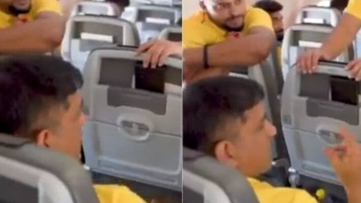 watch video humble dhoni swaps his business class seat with economy class passenger watch video humble dhoni swaps his business class seat with economy class passenger